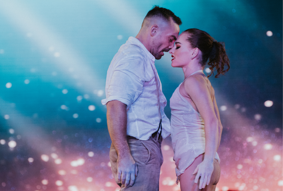 Circus duo performing on stage