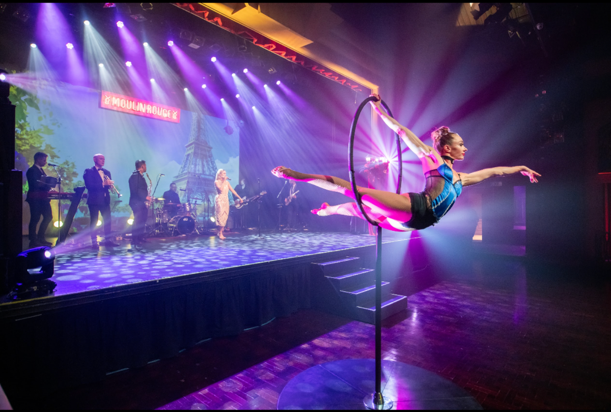 Lollipop lyra performer performing at a high end event