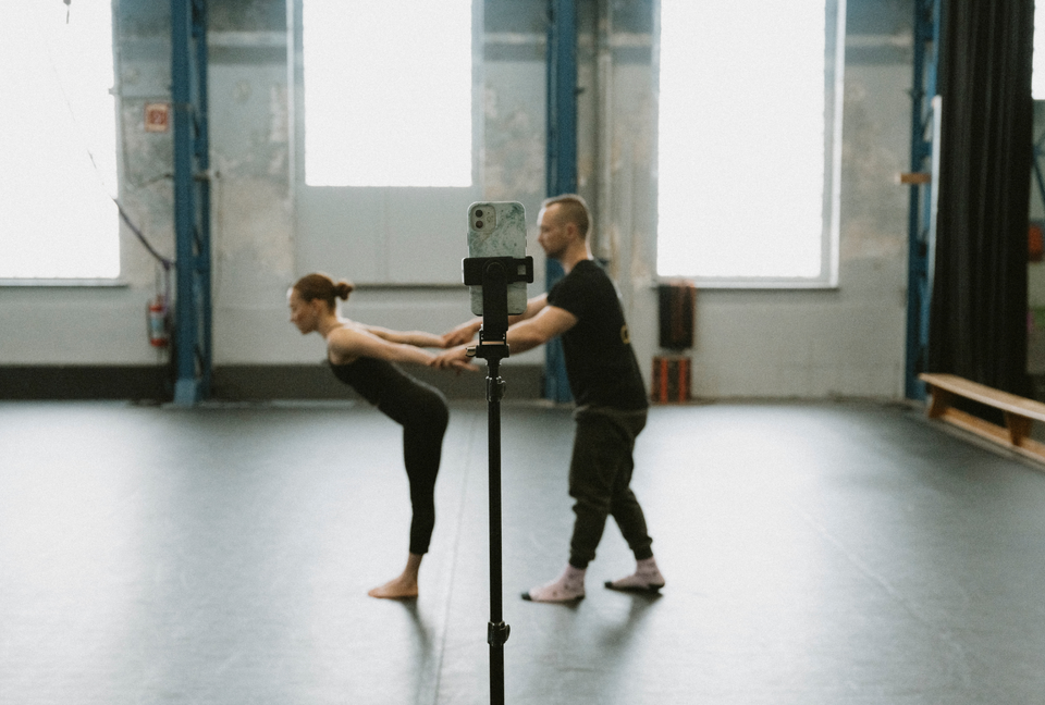 Circus duo warming up for an audition - hand to hand grip by AcroGrip liquid chalk