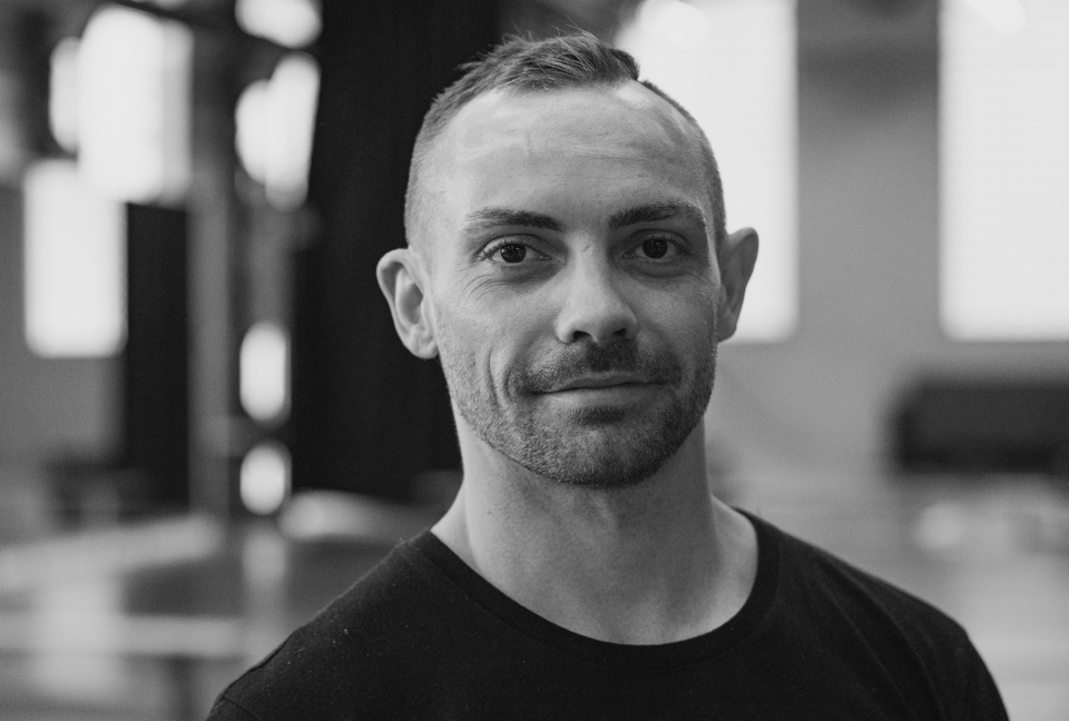 Headshot of a male acrobat