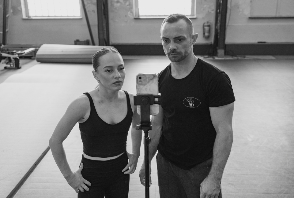 Circus duo training at a circus studio